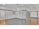Open floor plan that includes a glass doors for access to the backyard at 5370 Boxtree Ct, Dade City, FL 33523