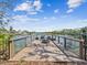 Waterfront dock with chairs and firepit for enjoying the waterway with all your Gathering and friends at 5903 Cachette De Riviera Ct, New Port Richey, FL 34655