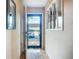 Bright entryway with tile flooring, leading into the home's interior, filled with natural light at 6012 28Th W St, Bradenton, FL 34207