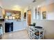 Cozy kitchen with adjacent breakfast nook and open view into living spaces, creating a connected atmosphere at 6012 28Th W St, Bradenton, FL 34207