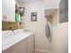 Functional laundry area with modern appliances, storage shelving, and ample workspace at 6012 28Th W St, Bradenton, FL 34207
