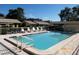 Community pool with lounge chairs and buildings in the background at 6012 28Th W St, Bradenton, FL 34207