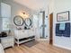 Modern bathroom featuring a double vanity, walk-in shower, and ample lighting at 9712 Little Gasparilla Is, Boca Grande, FL 33921