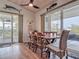 Dining room with direct access to outdoor deck via sliding glass doors at 9712 Little Gasparilla Is, Boca Grande, FL 33921