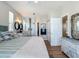 Spacious main bedroom with a bathroom view and a walk-in closet at 9712 Little Gasparilla Is, Boca Grande, FL 33921