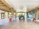 Under-home space perfect for parking a golf cart and storing outdoor equipment at 9712 Little Gasparilla Is, Boca Grande, FL 33921