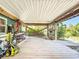 Spacious under-home area with ample storage and a golf cart at 9712 Little Gasparilla Is, Boca Grande, FL 33921
