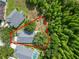 Aerial view showcasing property lines, surrounding greenery, and a well-maintained yard at 16804 Hawkridge Rd, Lithia, FL 33547