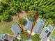 Aerial view of home showcasing property lines, close proximity to neighbors, and lush backyard at 16804 Hawkridge Rd, Lithia, FL 33547