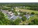 Aerial view of the neighborhood with mature trees, offering a sense of community at 16804 Hawkridge Rd, Lithia, FL 33547