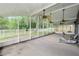 Over-sized screened porch, great for entertaining, offering lots of light and privacy at 16804 Hawkridge Rd, Lithia, FL 33547