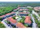 Aerial view of the complex with beautiful landscaping and a community pool at 18001 Richmond Place Dr # 337, Tampa, FL 33647