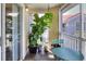 Cozy screened balcony with plants overlooking community at 18001 Richmond Place Dr # 337, Tampa, FL 33647