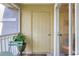 Charming balcony features a cozy seating area with lush plants, perfect for relaxation at 18001 Richmond Place Dr # 337, Tampa, FL 33647