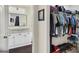 Conveniently situated bathroom across from a closet with modern fixtures and natural light at 18001 Richmond Place Dr # 337, Tampa, FL 33647