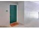 Apartment 337 features a solid door, modern hardware, and decorative welcome mat, plus painted textured walls at 18001 Richmond Place Dr # 337, Tampa, FL 33647
