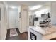 Modern kitchen with stainless steel appliances, white cabinets, and granite countertops at 18001 Richmond Place Dr # 337, Tampa, FL 33647
