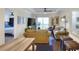 Inviting living room with modern decor, a ceiling fan, and a sliding glass door to a balcony at 18001 Richmond Place Dr # 337, Tampa, FL 33647
