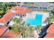 Overhead view of the pool and deck with lounge seating at 18001 Richmond Place Dr # 337, Tampa, FL 33647