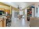 Bright breakfast nook with table, chairs, and backyard pool view at 1909 Masters Way, Plant City, FL 33566