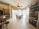 Eat-in kitchen and dining area with views of the pool and backyard at 1909 Masters Way, Plant City, FL 33566