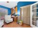 Bright office with wood floors, lots of storage and a large window, perfect for working from home at 1909 Masters Way, Plant City, FL 33566