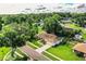 Charming single-story home with mature trees, a long driveway, and lush green landscaping at 2223 Wildwood Hollow Dr, Valrico, FL 33596