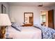 Bedroom features hardwood floors, neutral walls, and natural light at 2223 Wildwood Hollow Dr, Valrico, FL 33596