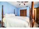 Primary bedroom with a four-poster bed and closet at 2223 Wildwood Hollow Dr, Valrico, FL 33596