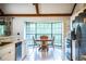 Sun-filled breakfast nook area featuring a bay window and seating for four at 2223 Wildwood Hollow Dr, Valrico, FL 33596