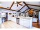 Spacious kitchen with views to stone fireplace in living room and dining room at 2223 Wildwood Hollow Dr, Valrico, FL 33596