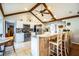 Bright, open kitchen with stainless appliances, breakfast bar, and eat-in dining area at 2223 Wildwood Hollow Dr, Valrico, FL 33596