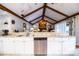 Bright kitchen with stone counters and stainless steel dishwasher at 2223 Wildwood Hollow Dr, Valrico, FL 33596