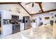 Modern kitchen with stainless steel appliances and stone countertops at 2223 Wildwood Hollow Dr, Valrico, FL 33596