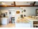 Bright kitchen with stone counters and bar seating at 2223 Wildwood Hollow Dr, Valrico, FL 33596