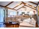 Bright and airy living room with vaulted ceiling, hardwood floors and open floor plan at 2223 Wildwood Hollow Dr, Valrico, FL 33596