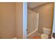 Bathroom with a bathtub, shower curtain, and toilet creating a functional and practical space at 2721 Walden Woods Dr, Plant City, FL 33566