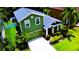 Well-kept two-story home with a lush lawn, a welcoming porch, and a convenient attached two-car garage at 2721 Walden Woods Dr, Plant City, FL 33566