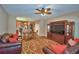 Living Room and dining area with wood floors and comfortable seating next to Kitchen at 2721 Walden Woods Dr, Plant City, FL 33566
