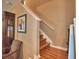 Stairway features wood steps with white risers and neutral wall color at 2721 Walden Woods Dr, Plant City, FL 33566