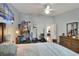 Comfortable bedroom featuring workout equipment and decor at 34852 Teeview Ln, Zephyrhills, FL 33541