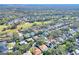 Suburban aerial view featuring homes with pools and lush landscaping in a well-established neighborhood at 3507 Autumn Glen Dr, Valrico, FL 33596