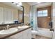 Bathroom with double sinks, granite countertops, shower and toilet at 3507 Autumn Glen Dr, Valrico, FL 33596