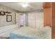 Bright bedroom featuring a large closet, soft grey walls and white trim at 3507 Autumn Glen Dr, Valrico, FL 33596