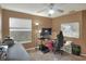 Office with computer and rolling chair and a large window at 3507 Autumn Glen Dr, Valrico, FL 33596
