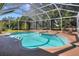 The property features a sparkling screened-in pool and spa, great for relaxing outdoors at 3507 Autumn Glen Dr, Valrico, FL 33596