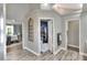 Hallway provides entry to walk-in closet, and bathroom at 8721 Latham Ln, Hudson, FL 34667