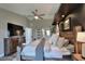 Comfortable main bedroom with en-suite bathroom access and plenty of space at 8721 Latham Ln, Hudson, FL 34667