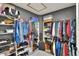 Walk-in closet with closet system and plenty of storage at 8721 Latham Ln, Hudson, FL 34667