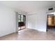 This bedroom features tiled floors and access to the outdoors through sliding doors at 11704 Raintree Village Blvd # B, Temple Terrace, FL 33617